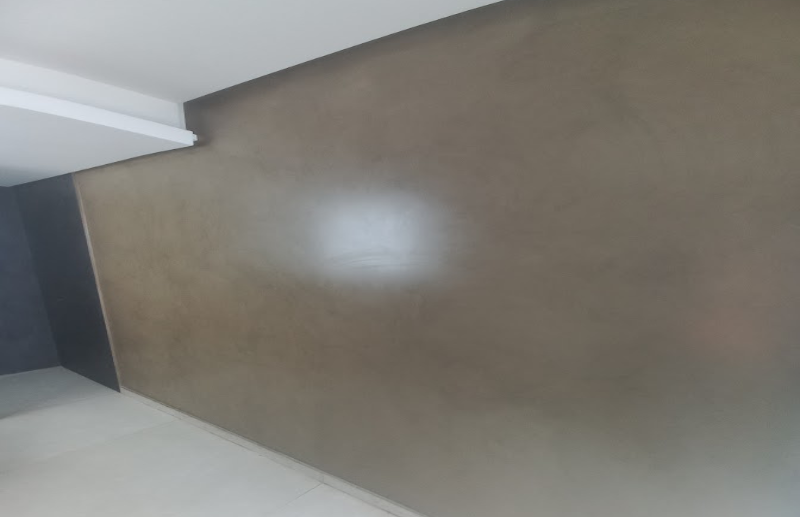 Polished micro screed feature wall in bedroom